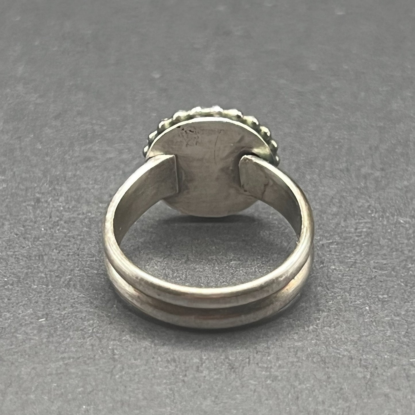 Image shows back side of ring, with split shank band.