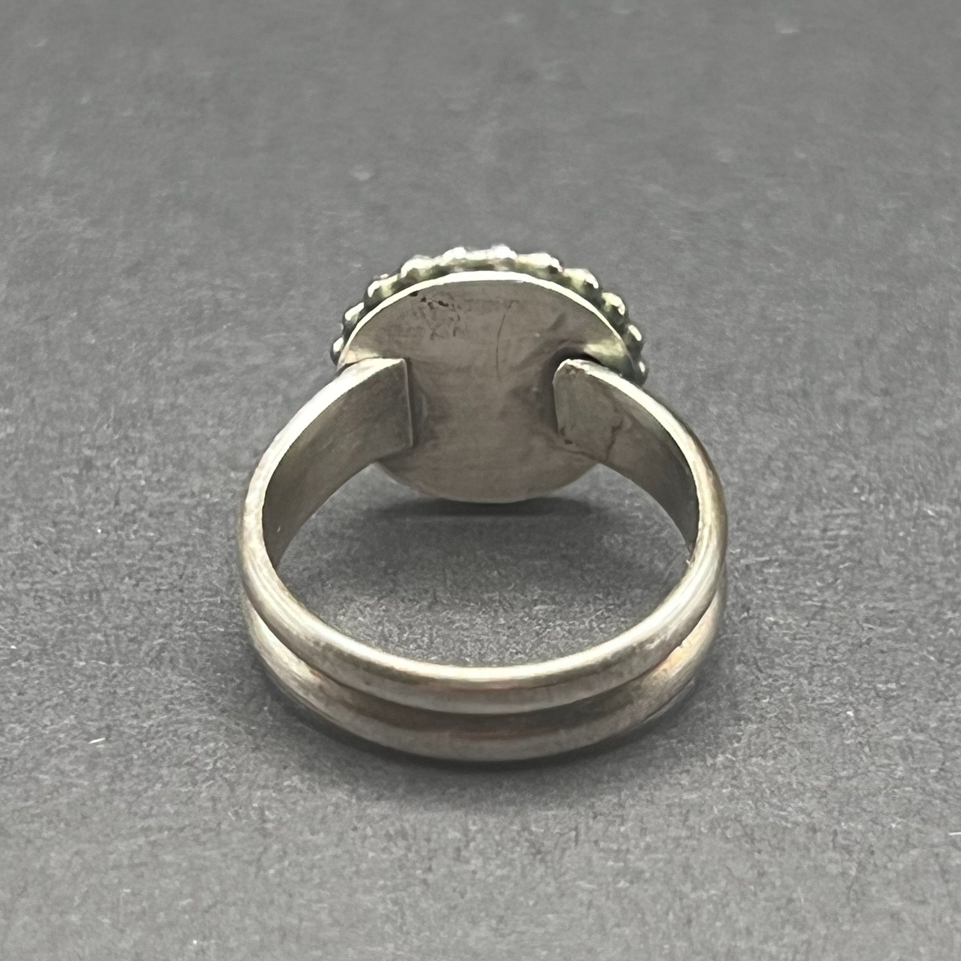 Image shows back side of ring, with split shank band.