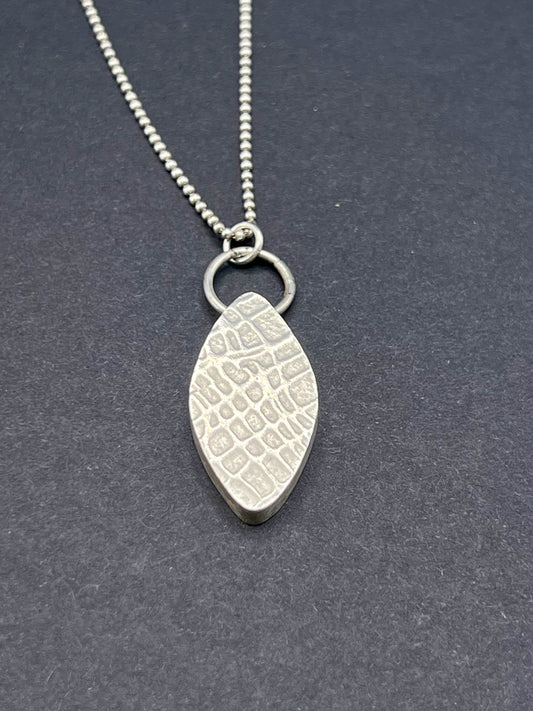 Hollow form, reversible marquis pendant (honeycomb/woven pattern)
