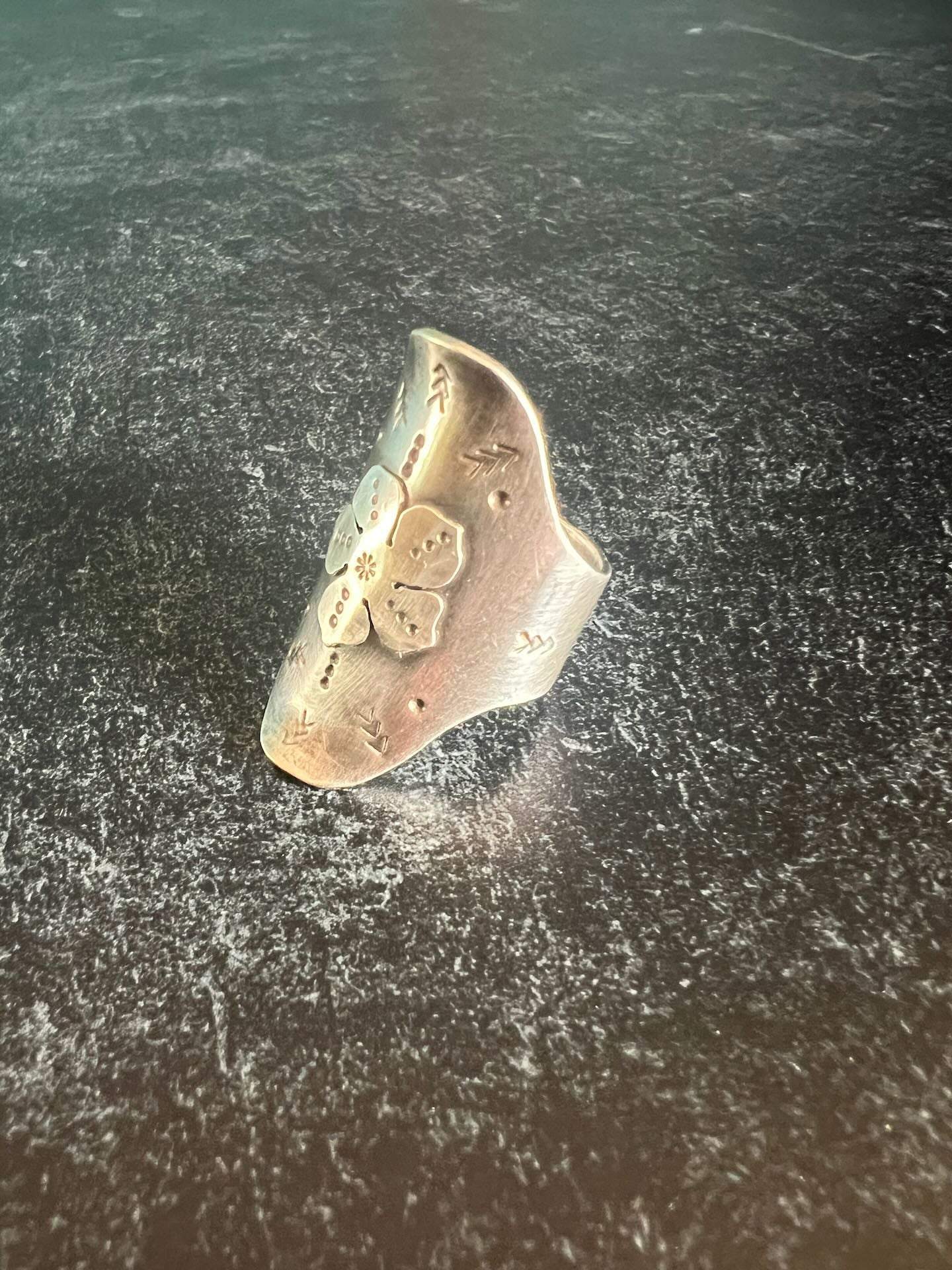 Stamped saddle ring with flower (size 8.75)