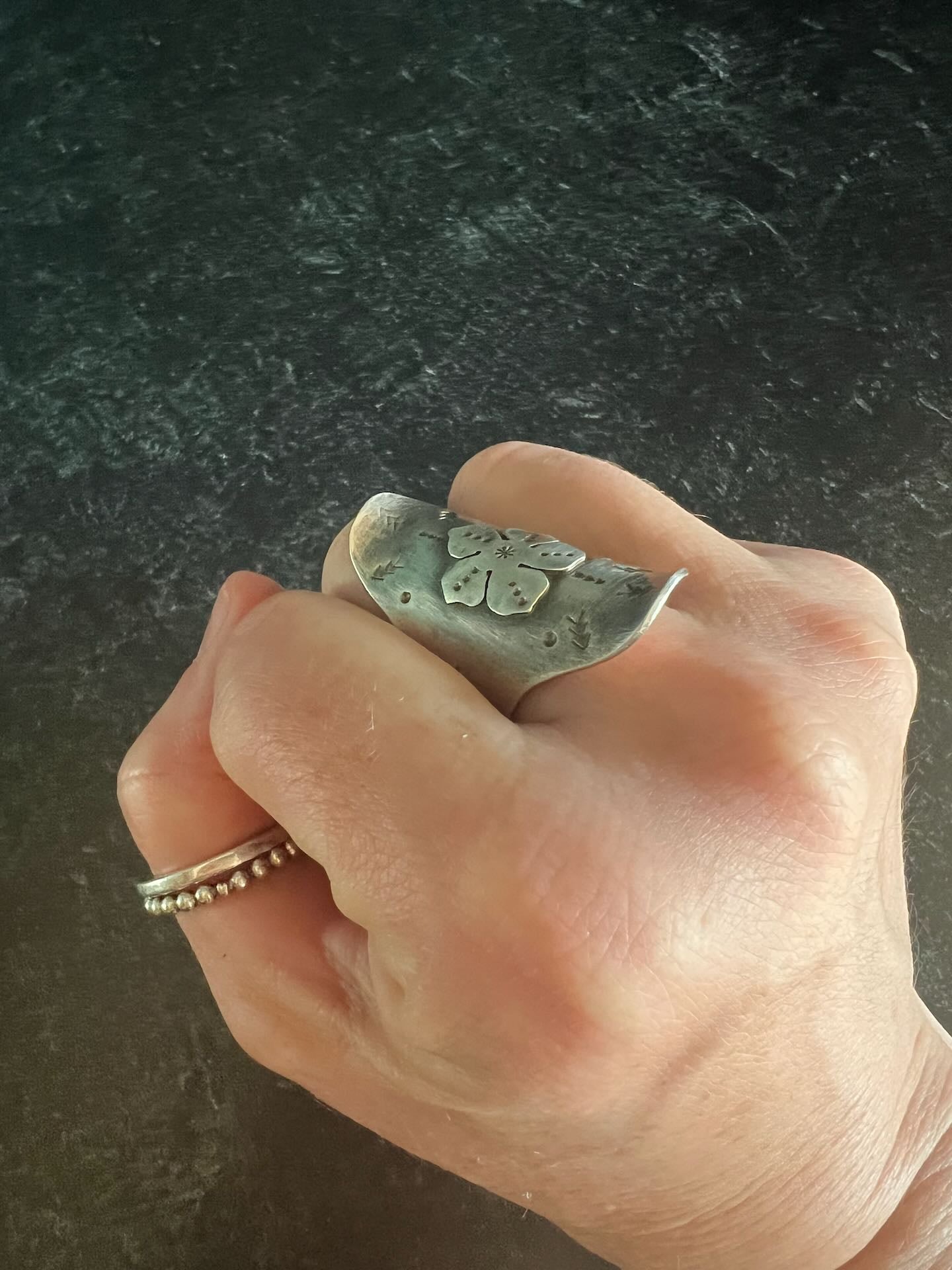 Stamped saddle ring with flower (size 8.75)