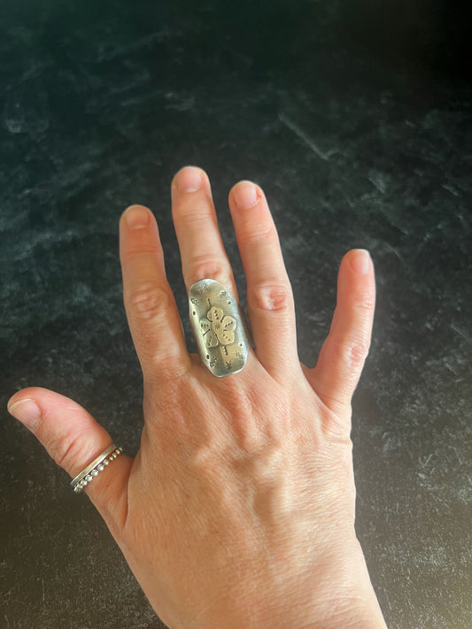 Stamped saddle ring with flower (size 8.75)